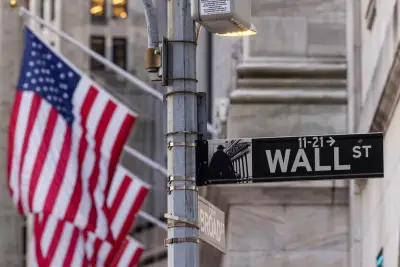 Global shares slide and US futures and dollar drop after Moody’s downgrade of US credit rating